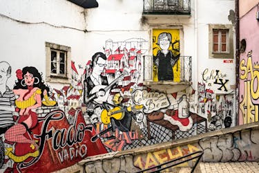 Guided walking tour of Lisbon with dinner to discover fado